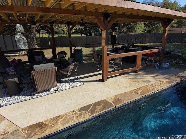 view of patio / terrace with a fenced in pool