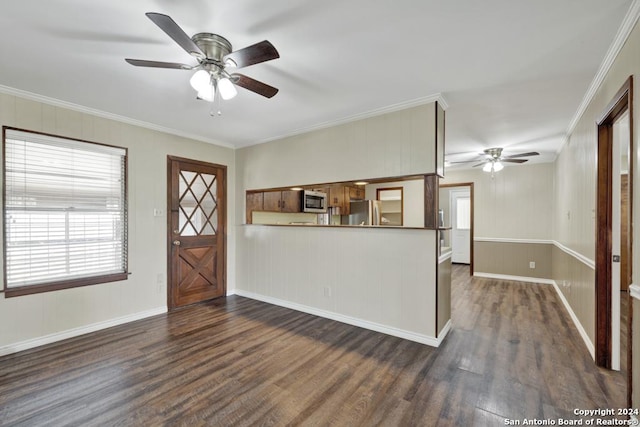 entryway featuring ceiling fan, dark hardwood / wood-style flooring, and ornamental molding