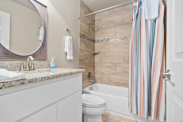 full bathroom with tile patterned floors, vanity, shower / bathtub combination with curtain, and toilet