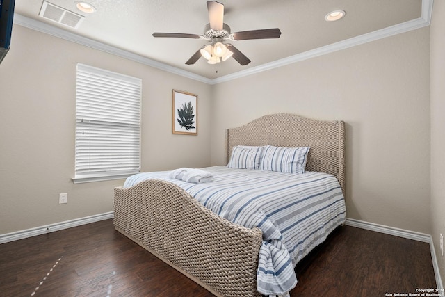 bedroom with dark hardwood / wood-style floors, ceiling fan, and crown molding