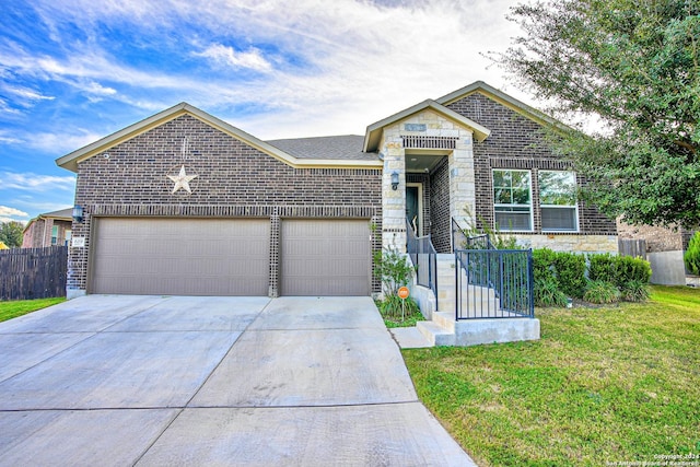 view of front facade featuring a garage and a front yard