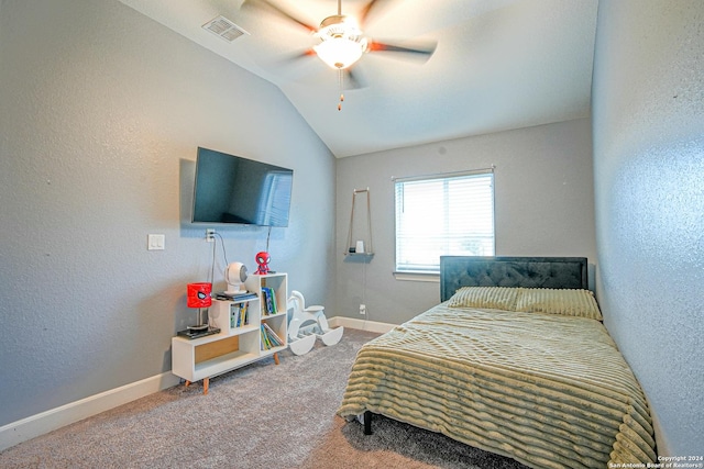 bedroom with carpet flooring, ceiling fan, and lofted ceiling