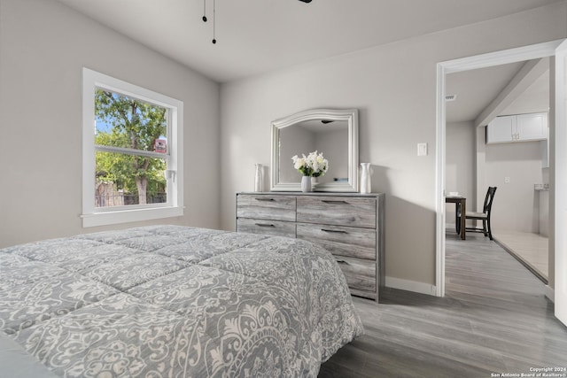 bedroom featuring light hardwood / wood-style flooring