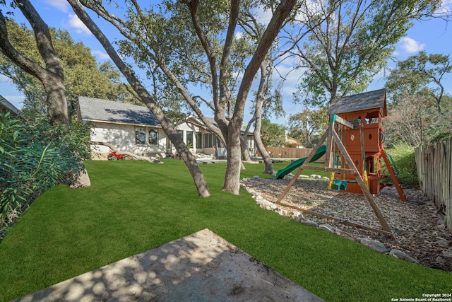 view of yard with a playground