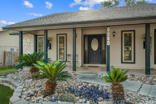 property entrance featuring a porch