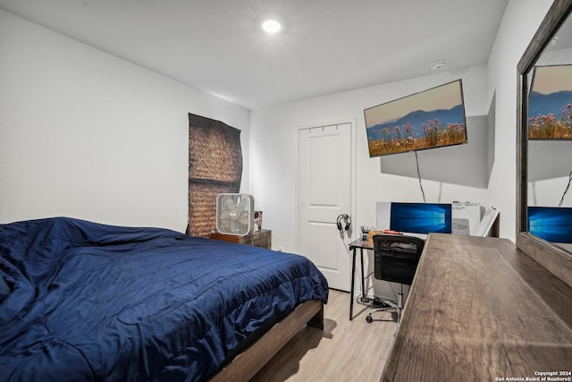 bedroom with light hardwood / wood-style floors