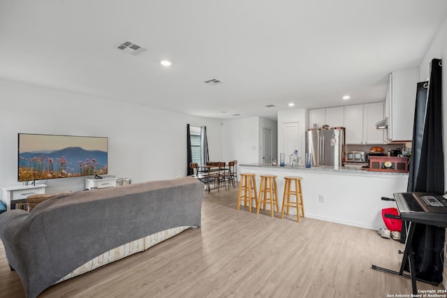 living room featuring light hardwood / wood-style flooring