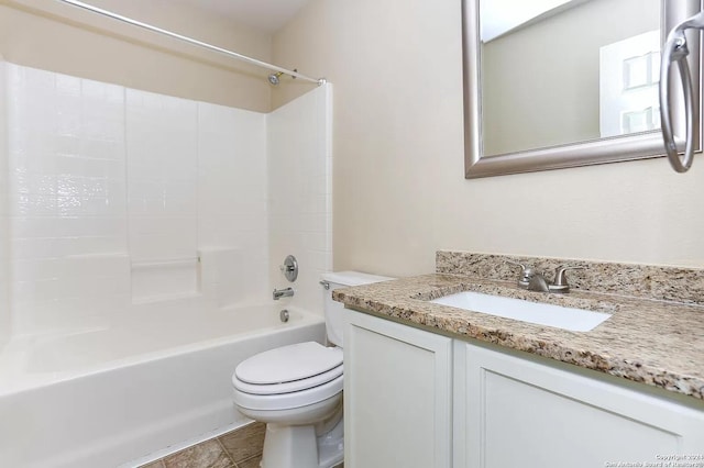 full bathroom with toilet, vanity, and tub / shower combination