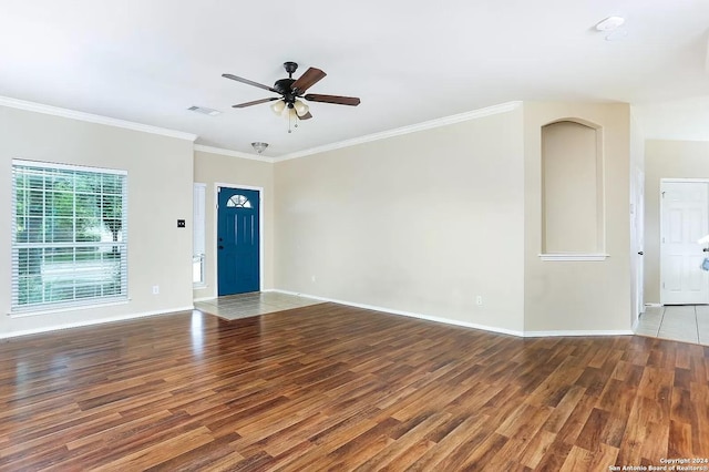 unfurnished room featuring hardwood / wood-style floors, ceiling fan, and ornamental molding