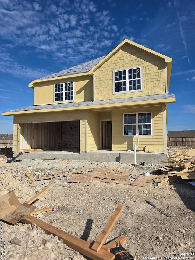 view of front of property featuring a garage