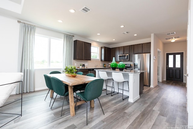 dining area featuring light hardwood / wood-style floors