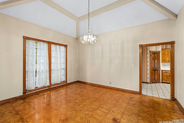 empty room featuring a chandelier, vaulted ceiling with beams, and parquet flooring