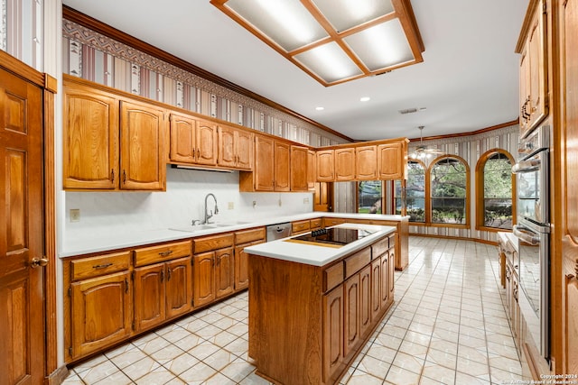 kitchen with black electric stovetop, ornamental molding, sink, a center island, and hanging light fixtures