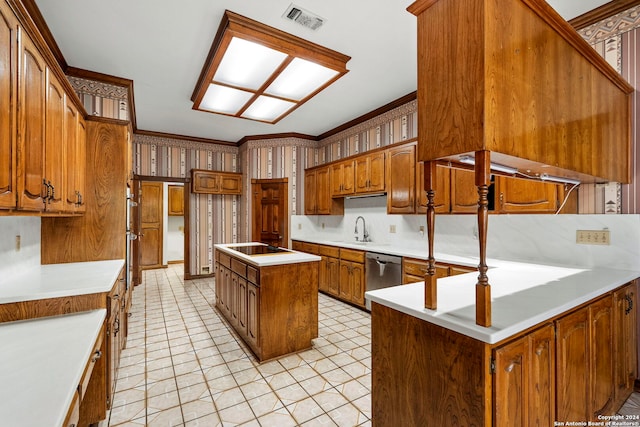 kitchen featuring ornamental molding, black electric cooktop, sink, dishwasher, and a center island