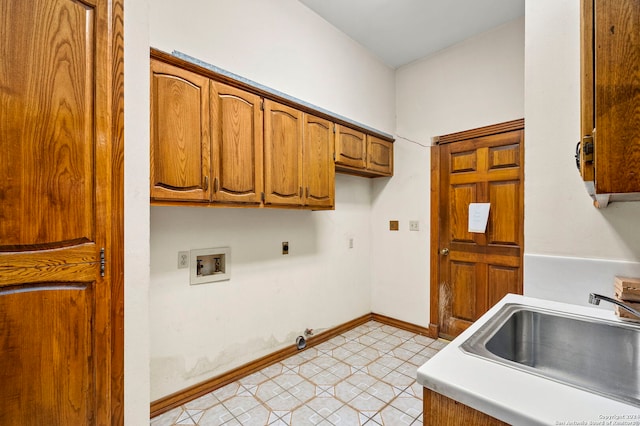 kitchen featuring light tile patterned flooring and sink