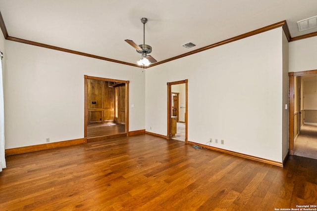 unfurnished room with ceiling fan, crown molding, and wood-type flooring