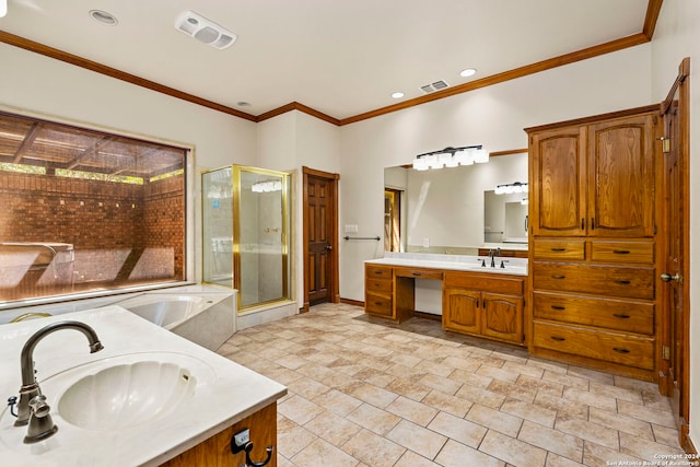 bathroom with vanity, crown molding, and independent shower and bath