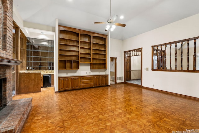 unfurnished living room with ceiling fan, lofted ceiling, a fireplace, and light parquet flooring