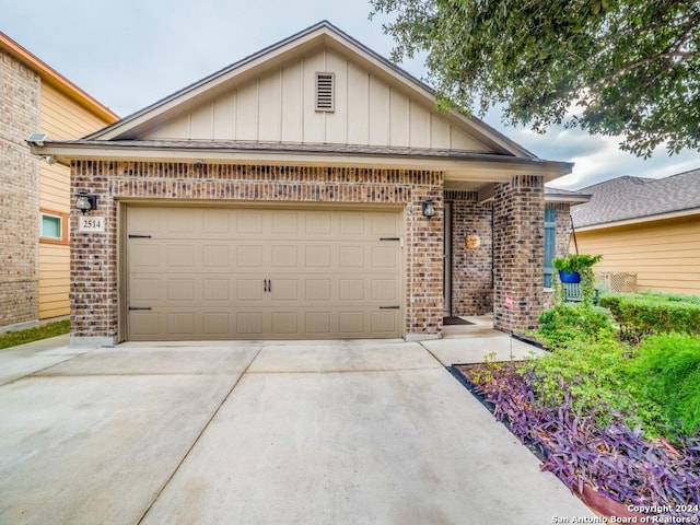 view of front of home with a garage