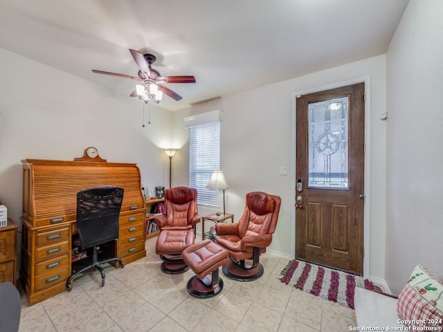 office area featuring light tile patterned floors and ceiling fan