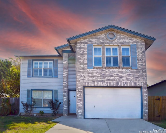 view of front of property with a garage