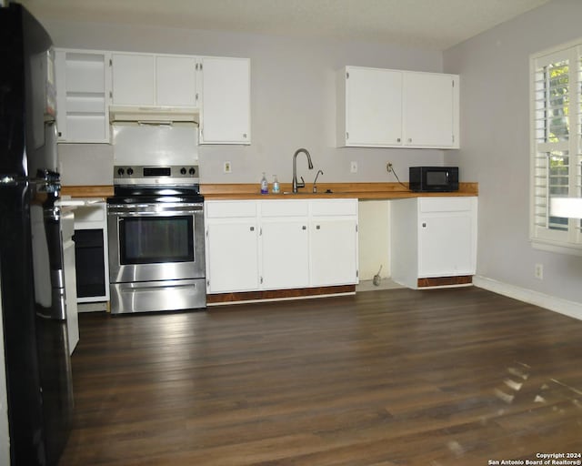 kitchen featuring sink, dark hardwood / wood-style floors, white cabinetry, and black appliances