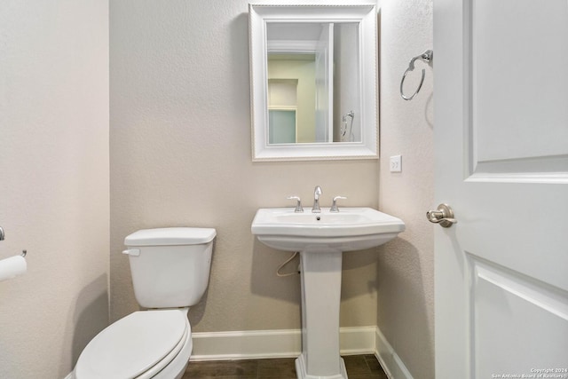 bathroom featuring toilet