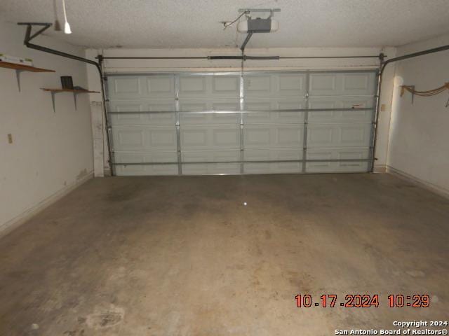 garage with a garage door opener