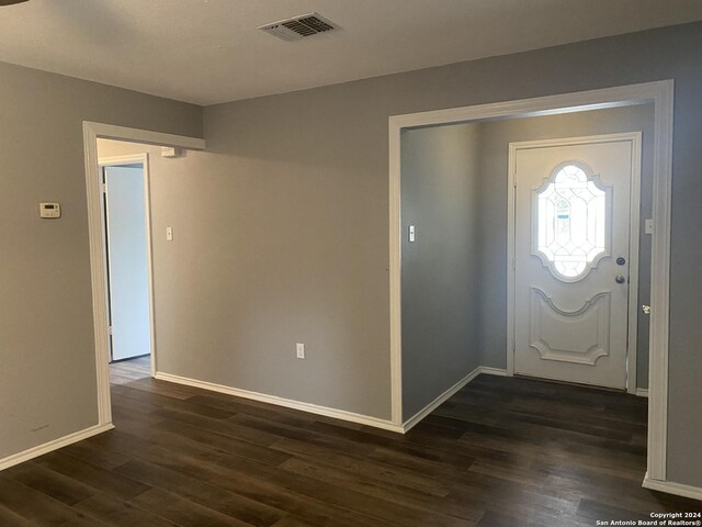 entrance foyer with dark wood-type flooring