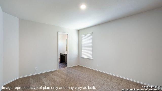 view of carpeted spare room