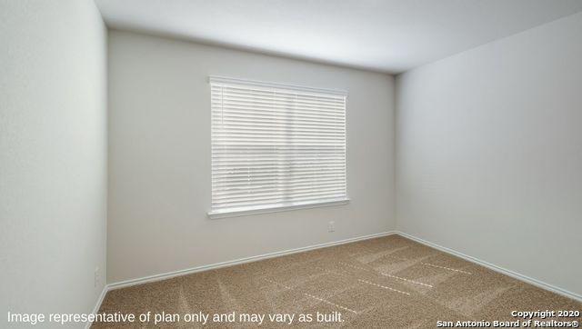 unfurnished room featuring carpet flooring