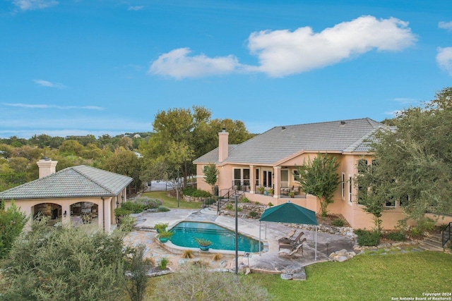 view of pool featuring a patio area