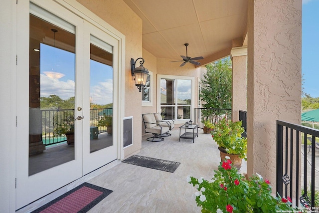 view of patio featuring french doors and ceiling fan