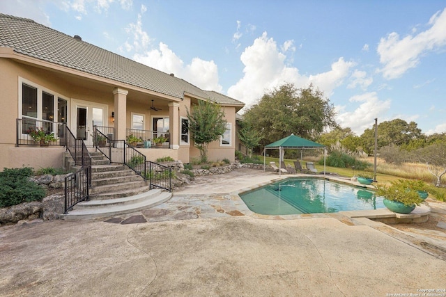 view of pool with a gazebo and a patio area