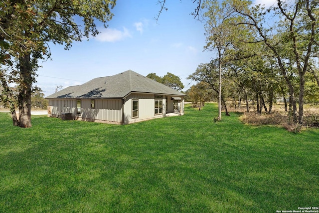 exterior space with a yard