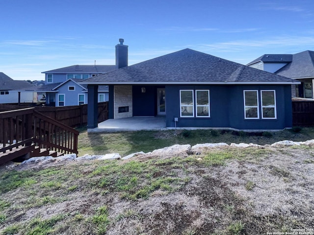 back of house featuring a patio