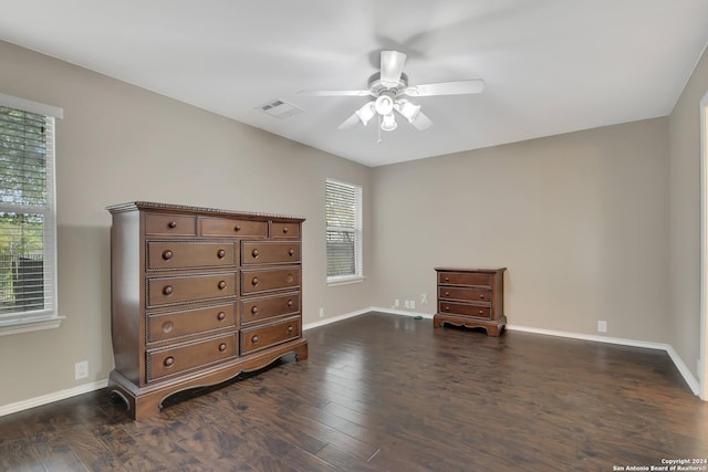 bedroom featuring dark hardwood / wood-style floors and ceiling fan