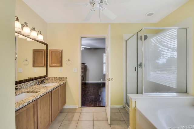 bathroom with tile patterned flooring, shower with separate bathtub, vanity, and ceiling fan