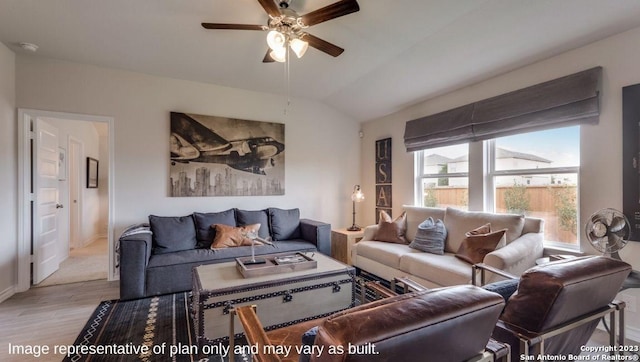 living room featuring ceiling fan, light wood-type flooring, and vaulted ceiling