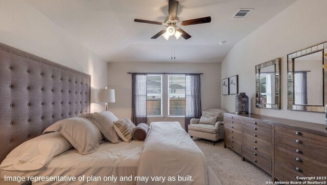 carpeted bedroom featuring ceiling fan and lofted ceiling