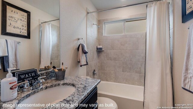 full bathroom with vanity, toilet, and shower / bathtub combination with curtain