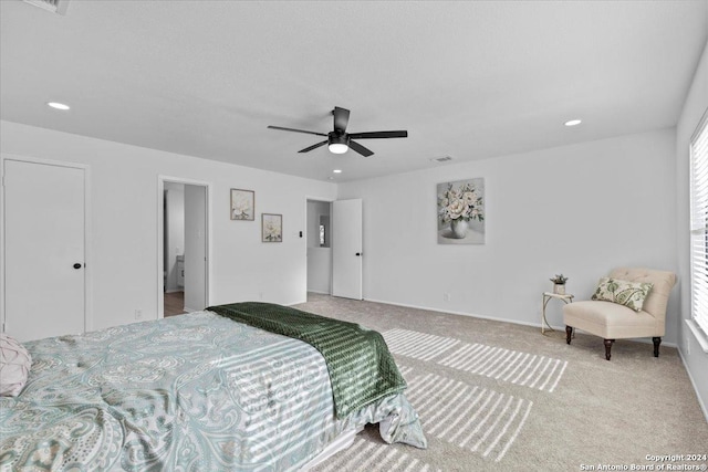 carpeted bedroom featuring ceiling fan