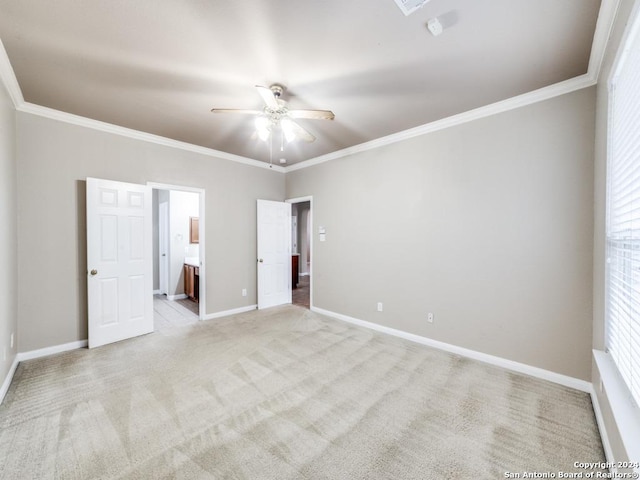 unfurnished bedroom featuring light carpet, ensuite bathroom, ceiling fan, and crown molding