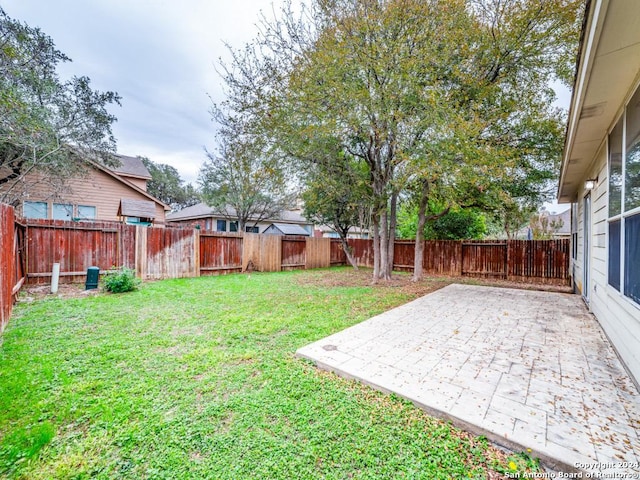 view of yard with a patio area