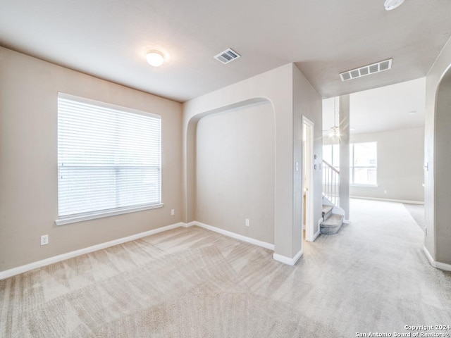 empty room with light carpet