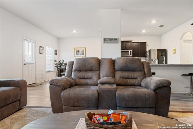 living room with light hardwood / wood-style floors