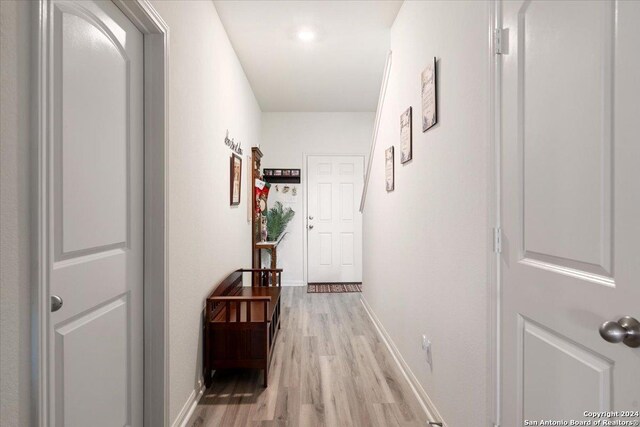 corridor featuring light wood-type flooring