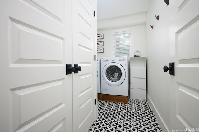 washroom featuring washer / dryer