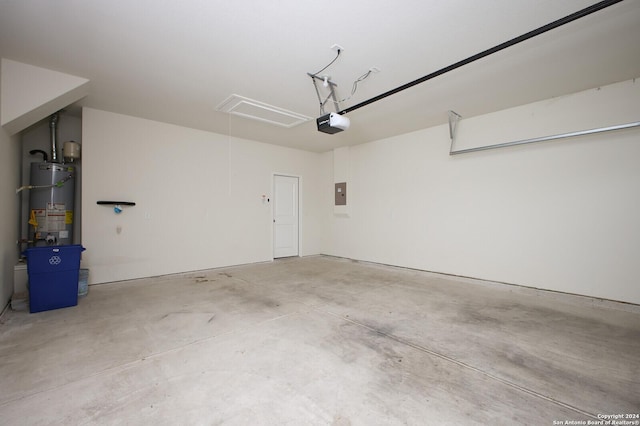 garage featuring electric panel, gas water heater, and a garage door opener