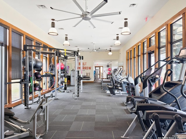 gym featuring ceiling fan